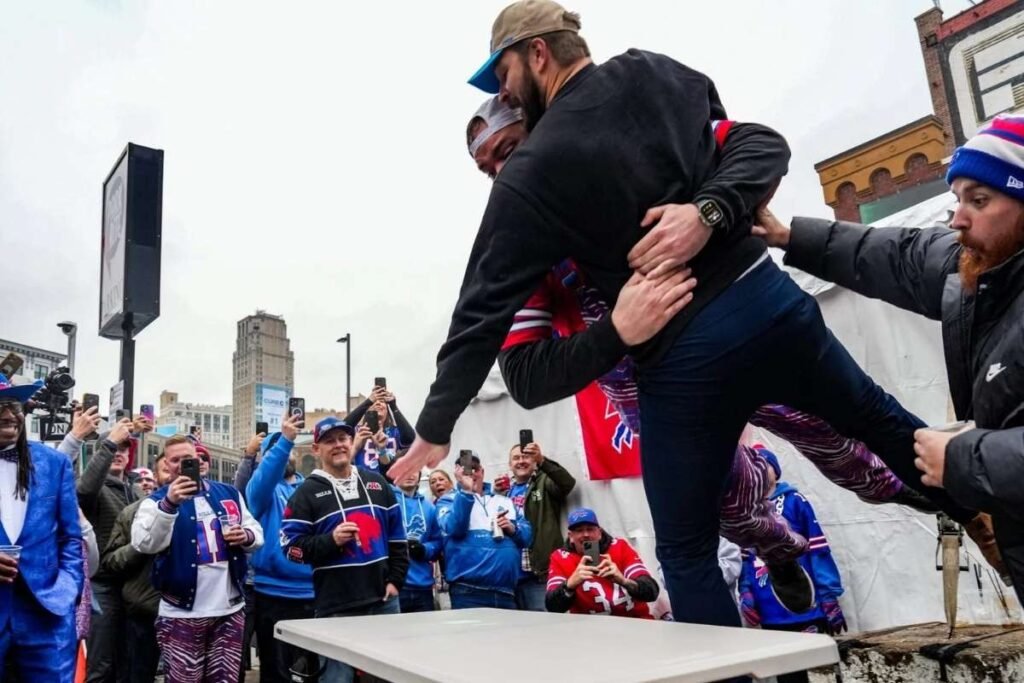 10 Bizarre Tailgating Traditions Only Americans Understand (The Buffalo Bills one is WILD) 1 bills table smash